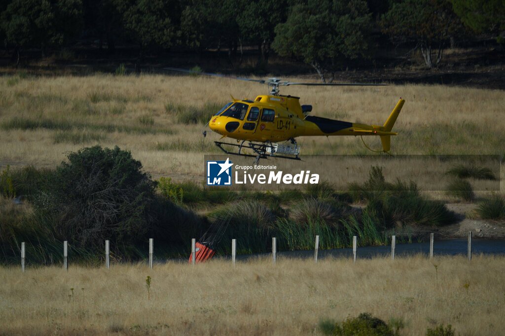 Helicopters help fight fires in San Martin de Valdeiglesias, west of Madrid, Spain, Tuesday, July 28, 2026 - NEWS - ENVIRONMENT