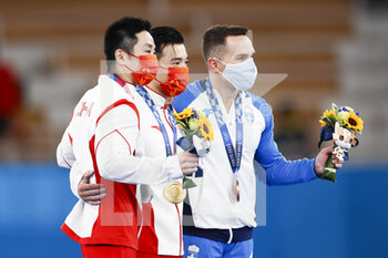 2020-08-02 - YOU Hao (CHN) Silver Medal, LIU Yang (CHN) Gold Medal, PETROUNIAS Eleftherios (GRE) Bronze Medal during the Olympic Games Tokyo 2020, Artistic Gymnastics Men's Apparatus Rings Final on August 2, 2021 at Ariake Gymnastics Centre in Tokyo, Japan - Photo Kanami Yoshimura / Photo Kishimoto / DPPI - OLYMPIC GAMES TOKYO 2020, AUGUST 02, 2021 - OLYMPIC GAMES TOKYO 2020 - OLYMPIC GAMES