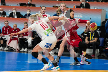 02/12/2021 - Fadwa Aouij of Tunisia competes with Kathrine Heindahl of Denmark during the IHF Women's World Championship 2021, Group F handball match between Denmark and Tunisia on December 2, 2021 at Palau d'Esports de Granollers in Granollers, Barcelona, Spain - IHF WOMEN'S WORLD CHAMPIONSHIP 2021, GROUP F - DENMARK VS TUNISIA - PALLAMANO - ALTRO