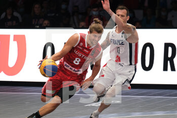 2021-09-11 - Moritz Lanegger (Austria) and Antoine Eito (France) in action - FIBA 3X3 EUROPE CUP 2021 (2ND DAY) - EUROCUP - BASKETBALL
