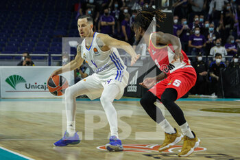 2021-10-13 - Thomas Heurtel of Real Madrid and Paris Lee of Monaco in action during the Turkish Airlines Euroleague basketball match between Real Madrid and AS Monaco on October 13, 2021 at Wizink Center in Madrid, Spain - REAL MADRID VS AS MONACO - EUROLEAGUE - BASKETBALL