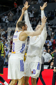 2021-10-21 - Fabien Causer and Williams-Goss of Real Madrid celebrate the victory during the Turkish Airlines Euroleague basketball match between Real Madrid and Fenerbahce on October 21, 2021 at Wizink Center in Madrid, Spain - REAL MADRID VS FENERBAHCE - EUROLEAGUE - BASKETBALL
