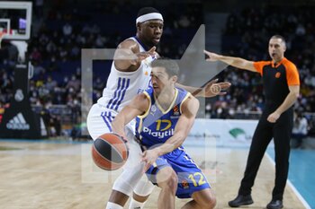 2021-12-02 - Guerschon Yabusele of Real Madrid and John DiBartolomeo of Maccabi Playtika Tel Aviv during the Turkish Airlines Euroleague basketball match between Real Madrid and Maccabi Playtika Tel Aviv on December 2, 2021 at Wizink Center in Madrid, Spain - REAL MADRID VS MACCABI PLAYTIKA TEL AVIV - EUROLEAGUE - BASKETBALL