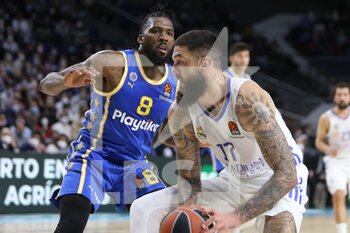 2021-12-02 - Vincent Poirier of Real Madrid and Jalen Reynolds of Maccabi Playtika Tel Aviv during the Turkish Airlines Euroleague basketball match between Real Madrid and Maccabi Playtika Tel Aviv on December 2, 2021 at Wizink Center in Madrid, Spain - REAL MADRID VS MACCABI PLAYTIKA TEL AVIV - EUROLEAGUE - BASKETBALL