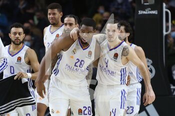 2021-12-02 - Guerschon Yabusele and Thomas Heurtel of Real Madrid celebrate after the Turkish Airlines Euroleague basketball match between Real Madrid and Maccabi Playtika Tel Aviv on December 2, 2021 at Wizink Center in Madrid, Spain - REAL MADRID VS MACCABI PLAYTIKA TEL AVIV - EUROLEAGUE - BASKETBALL