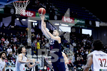 2021-11-28 - Dusan RISTIC (14) of Serbia during the FIBA Basketball World Cup 2023, European Qualifiers, 1st round Group A Basketball match between Belgium and Serbia on November 28, 2021 at the Mons Arena in Mons, Belgium - FIBA BASKETBALL WORLD CUP 2023, EUROPEAN QUALIFIERS, 1ST ROUND GROUP A - BELGIUM VS SERBIA - INTERNATIONALS - BASKETBALL