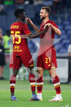 2021-08-14 - Borja Mayoral of Roma (R) celebrates with Ebrima Darboe (L) after scoring 5-0 goal during the Pre-Season Friendly football match between AS Roma and Raja Casablanca on August 14, 2021 at Stadio Olimpico in Rome, Italy - Photo Federico Proietti / DPPI - AS ROMA VS RAJA CASABLANCA - FRIENDLY MATCH - SOCCER