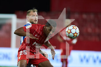 2021-09-09 - John Guidetti of Alaves and Fernando Reges of Sevilla during the football friendly match played between Sevilla Futbol Club and Deportivo Alaves Madrid at Ramon Sanchez-Pizjuan Stadium on September 9, 2021 in Sevilla, Spain - SEVILLA FUTBOL CLUB VS DEPORTIVO ALAVES MADRID AT RAMON SANCHEZ-PIZJUAN STADIUM - FRIENDLY MATCH - SOCCER