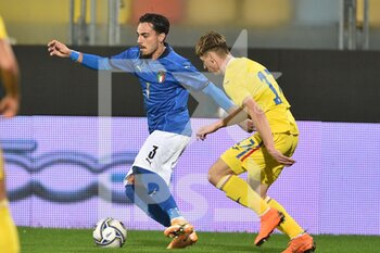 2021-11-16 - FROSINONE, ITALY - November 16 : Quaglia Giacomo   ( L) of  Italy competes for the ball  Corbu Marius Dumitru  (R) of Romania  during   Friendly Match soccer match between  Italy and Romania Benito Stirpe on November 16,2021 in Frosinone Italy - UNDER 21 TEST MATCH 2021 - ITALY VS ROMANIA - FRIENDLY MATCH - SOCCER