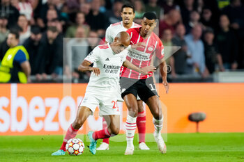 2021-08-24 - Joao Mario of Benfica and Cody Gakpo of PSV during the UEFA Champions League, Play-Offs Leg Two football match between PSV and Benfica on August 24, 2021 at Philips Stadion in Eindhoven, Netherlands - Photo Geert van Erven / Orange Pictures / DPPI - PLAY-OFFS LEG TWO PSV VS BENFICA - UEFA CHAMPIONS LEAGUE - SOCCER