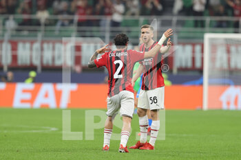 2021-09-28 - Alexis Saelemaekers of AC Milan discusses with Davide Calabria of AC Milan during the UEFA Champions League 2021/22 Group Stage - Group B football match between AC Milan and Club Atletico de Madrid at Giuseppe Meazza Stadium, Milan, Italy on September 28, 2021 - AC MILAN VS ATLETICO MADRID - UEFA CHAMPIONS LEAGUE - SOCCER