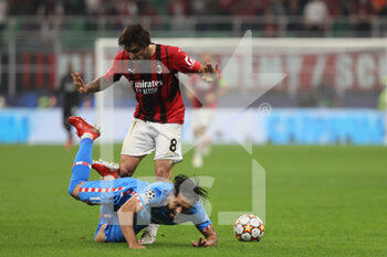 2021-09-28 - Felipe of Club Atletico de Madrid fights for the ball against Sandro Tonali of AC Milan during the UEFA Champions League 2021/22 Group Stage - Group B football match between AC Milan and Club Atletico de Madrid at Giuseppe Meazza Stadium, Milan, Italy on September 28, 2021 - AC MILAN VS ATLETICO MADRID - UEFA CHAMPIONS LEAGUE - SOCCER