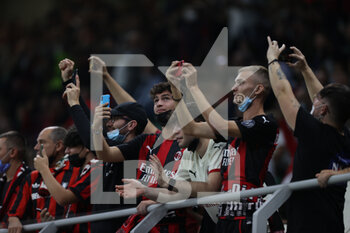 2021-09-28 - Fans attend during the UEFA Champions League 2021/22 Group Stage - Group B football match between AC Milan and Club Atletico de Madrid at Giuseppe Meazza Stadium, Milan, Italy on September 28, 2021 - AC MILAN VS ATLETICO MADRID - UEFA CHAMPIONS LEAGUE - SOCCER