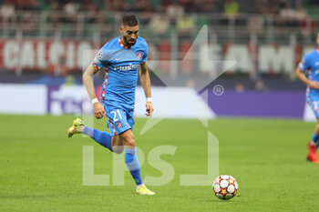 2021-09-28 - Yannick Ferreira Carrasco of Club Atletico de Madrid in action during the UEFA Champions League 2021/22 Group Stage - Group B football match between AC Milan and Club Atletico de Madrid at Giuseppe Meazza Stadium, Milan, Italy on September 28, 2021 - AC MILAN VS ATLETICO MADRID - UEFA CHAMPIONS LEAGUE - SOCCER