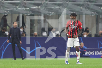 2021-09-28 - Rafael Leao of AC Milan celebrates after scoring a goal during the UEFA Champions League 2021/22 Group Stage - Group B football match between AC Milan and Club Atletico de Madrid at Giuseppe Meazza Stadium, Milan, Italy on September 28, 2021 - AC MILAN VS ATLETICO MADRID - UEFA CHAMPIONS LEAGUE - SOCCER