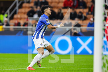 2021-11-03 - Luis Diaz of FC Porto celebrates after scoring a goal uring the UEFA Champions League 2021/22 Group Stage - Group B football match between AC Milan and FC Porto at Giuseppe Meazza Stadium, Milan, Italy on November 03, 2021 - AC MILAN VS FC PORTO - UEFA CHAMPIONS LEAGUE - SOCCER