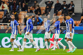 2021-11-03 - Luis Diaz of FC Porto celebrates with his teammates after scoring a goal during the UEFA Champions League 2021/22 Group Stage - Group B football match between AC Milan and FC Porto at Giuseppe Meazza Stadium, Milan, Italy on November 03, 2021 - AC MILAN VS FC PORTO - UEFA CHAMPIONS LEAGUE - SOCCER