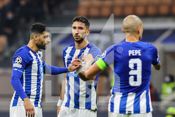 2021-11-03 - Marko Grujic of FC Porto looks on during the UEFA Champions League 2021/22 Group Stage - Group B football match between AC Milan and FC Porto at Giuseppe Meazza Stadium, Milan, Italy on November 03, 2021 - AC MILAN VS FC PORTO - UEFA CHAMPIONS LEAGUE - SOCCER