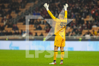 2021-11-03 - Diogo Costa of FC Porto gestures during the UEFA Champions League 2021/22 Group Stage - Group B football match between AC Milan and FC Porto at Giuseppe Meazza Stadium, Milan, Italy on November 03, 2021 - AC MILAN VS FC PORTO - UEFA CHAMPIONS LEAGUE - SOCCER