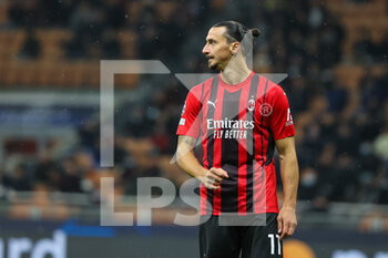 2021-11-03 - Zlatan Ibrahimovic of AC Milan looks on during the UEFA Champions League 2021/22 Group Stage - Group B football match between AC Milan and FC Porto at Giuseppe Meazza Stadium, Milan, Italy on November 03, 2021 - AC MILAN VS FC PORTO - UEFA CHAMPIONS LEAGUE - SOCCER