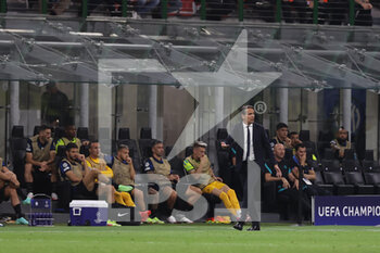 2021-09-15 - Simone Inzaghi Head Coach of FC Internazionale reacts from the bench during the UEFA Champions League 2021/22 Group Stage - Group D football match between FC Internazionale and Real Madrid CF at Giuseppe Meazza Stadium, Milan, Italy on September 15, 2021 - GROUP D - INTER - FC INTERNAZIONALE VS REAL MADRID - UEFA CHAMPIONS LEAGUE - SOCCER