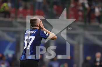 2021-09-15 - Milan Skriniar of FC Internazionale reacts during the UEFA Champions League 2021/22 Group Stage - Group D football match between FC Internazionale and Real Madrid CF at Giuseppe Meazza Stadium, Milan, Italy on September 15, 2021 - GROUP D - INTER - FC INTERNAZIONALE VS REAL MADRID - UEFA CHAMPIONS LEAGUE - SOCCER