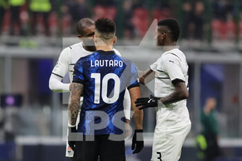 2021-11-24 - Lautaro Martinez of FC Internazionale and Marlon of FC Shakhtar Donetsk during the UEFA Champions League 2021/22 Group Stage - Group D football match between FC Internazionale and FC Shakhtar Donetsk at Giuseppe Meazza Stadium, Milan, Italy on November 24, 2021 - INTER - FC INTERNAZIONALE VS SHAKHTAR DONETSK - UEFA CHAMPIONS LEAGUE - SOCCER
