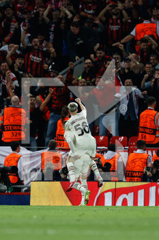 2021-09-15 - Ac Milan players celebrate the equalizer - GROUP B - LIVERPOOL FC VS AC MILAN - UEFA CHAMPIONS LEAGUE - SOCCER