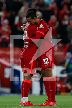 2021-09-15 - Joel Matip (Liverpool FC) celebrates the victory with a teammate - GROUP B - LIVERPOOL FC VS AC MILAN - UEFA CHAMPIONS LEAGUE - SOCCER
