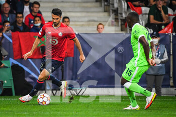 2021-09-14 - Zeki CELIK of Lille during the UEFA Champions League, Group Stage, Group G football match between Lille OSC (LOSC) and Verein fur Leibesubungen Wolfsburg on September 14, 2021 at Pierre Mauroy Stadium in Villeneuve-d'Ascq, France - LILLE OSC (LOSC) AND VEREIN FUR LEIBESUBUNGEN WOLFSBURG - UEFA CHAMPIONS LEAGUE - SOCCER