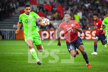 2021-09-14 - Maxence LACROIX of Wolfsburg and Jonathan DAVID of Lille during the UEFA Champions League, Group Stage, Group G football match between Lille OSC (LOSC) and Verein fur Leibesubungen Wolfsburg on September 14, 2021 at Pierre Mauroy Stadium in Villeneuve-d'Ascq, France - LILLE OSC (LOSC) AND VEREIN FUR LEIBESUBUNGEN WOLFSBURG - UEFA CHAMPIONS LEAGUE - SOCCER