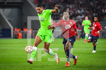 2021-09-14 - Maxence LACROIX of Wolfsburg and Jonathan DAVID of Lille during the UEFA Champions League, Group Stage, Group G football match between Lille OSC (LOSC) and Verein fur Leibesubungen Wolfsburg on September 14, 2021 at Pierre Mauroy Stadium in Villeneuve-d'Ascq, France - LILLE OSC (LOSC) AND VEREIN FUR LEIBESUBUNGEN WOLFSBURG - UEFA CHAMPIONS LEAGUE - SOCCER