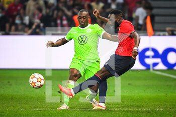 2021-09-14 - Jerome ROUSSILLON of Wolfsburg and Jonathan IKONE of Lille during the UEFA Champions League, Group Stage, Group G football match between Lille OSC (LOSC) and Verein fur Leibesubungen Wolfsburg on September 14, 2021 at Pierre Mauroy Stadium in Villeneuve-d'Ascq, France - LILLE OSC (LOSC) AND VEREIN FUR LEIBESUBUNGEN WOLFSBURG - UEFA CHAMPIONS LEAGUE - SOCCER