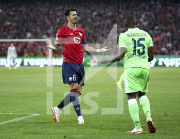2021-09-14 - Jose Fonte of Lille, Jerome Roussillon of Wolfsburg during the UEFA Champions League, Group Stage, Group G football match between Lille OSC (LOSC) and VfL Wolfsburg on September 14, 2021 at Stade Pierre Mauroy in Villeneuve-d?Ascq near Lille, France - LILLE OSC (LOSC) AND VEREIN FUR LEIBESUBUNGEN WOLFSBURG - UEFA CHAMPIONS LEAGUE - SOCCER