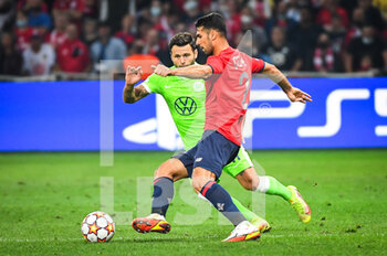 2021-09-14 - Renato STEFFEN of Wolfsburg and Zeki CELIK of Lille during the UEFA Champions League, Group Stage, Group G football match between Lille OSC (LOSC) and Verein fur Leibesubungen Wolfsburg on September 14, 2021 at Pierre Mauroy Stadium in Villeneuve-d'Ascq, France - LILLE OSC (LOSC) AND VEREIN FUR LEIBESUBUNGEN WOLFSBURG - UEFA CHAMPIONS LEAGUE - SOCCER