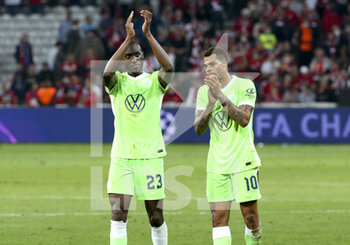 2021-09-14 - Josuha Guilavogui, Lukas Nmecha of Wolfsburg salute their supporters following the UEFA Champions League, Group Stage, Group G football match between Lille OSC (LOSC) and VfL Wolfsburg on September 14, 2021 at Stade Pierre Mauroy in Villeneuve-d?Ascq near Lille, France - LILLE OSC (LOSC) AND VEREIN FUR LEIBESUBUNGEN WOLFSBURG - UEFA CHAMPIONS LEAGUE - SOCCER