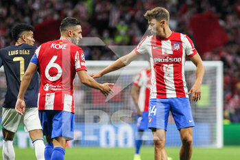 2021-09-15 - Koke Resurreccion and Marcos Llorente of Atletico de Madrid in action during the UEFA Champions League, Group B, football match played between Atletico de Madrid and FC Porto at Wanda Metropolitano stadium on September 15, 2021, in Madrid, Spain - GROUP B - ATLETICO DE MADRID VS FC PORTO - UEFA CHAMPIONS LEAGUE - SOCCER