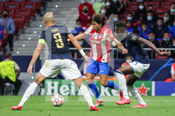 2021-09-15 - Chancel Mbemba of Porto and Joao Felix of Atletico de Madrid in action during the UEFA Champions League, Group B, football match played between Atletico de Madrid and FC Porto at Wanda Metropolitano stadium on September 15, 2021, in Madrid, Spain - GROUP B - ATLETICO DE MADRID VS FC PORTO - UEFA CHAMPIONS LEAGUE - SOCCER