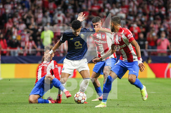 2021-09-15 - Antoine Griezmann of Atletico de Madrid and Luis Diaz of Porto, in actio during the UEFA Champions League, Group B, football match played between Atletico de Madrid and FC Porto at Wanda Metropolitano stadium on September 15, 2021, in Madrid, Spain - GROUP B - ATLETICO DE MADRID VS FC PORTO - UEFA CHAMPIONS LEAGUE - SOCCER