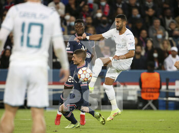 2021-09-28 - Riyad Mahrez of Manchester City, left Idrissa Gueye Gana, Marco Verratti of PSG during the UEFA Champions League, Group A football match between Paris Saint-Germain and Manchester City on September 28, 2021 at Parc des Princes stadium in Paris, France - PARIS SAINT-GERMAIN VS MANCHESTER CITY - UEFA CHAMPIONS LEAGUE - SOCCER