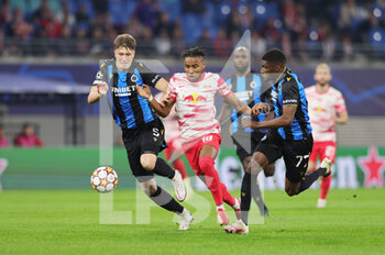 2021-09-28 - Christopher Nkunku of Leipzig and Jack Hendry, Clinton of Club Brugge during the UEFA Champions League, Group A football match between Red Bull Leipzig and Club Brugge on September 28, 2021 at Red Bull Arena in Leipzig, Germany - RED BULL LEIPZIG VS CLUB BRUGGE - UEFA CHAMPIONS LEAGUE - SOCCER