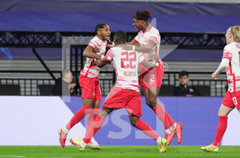 2021-09-28 - Christopher Nkunku of Leipzig celebrates after his goal with Nordi Mukiele, Mohamed Simakan during the UEFA Champions League, Group A football match between Red Bull Leipzig and Club Brugge on September 28, 2021 at Red Bull Arena in Leipzig, Germany - RED BULL LEIPZIG VS CLUB BRUGGE - UEFA CHAMPIONS LEAGUE - SOCCER