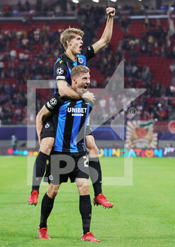 2021-09-28 - Charles De Ketelaere and Eduard Sobol of Club Brugge celebrate after winning the UEFA Champions League, Group A football match between Red Bull Leipzig and Club Brugge on September 28, 2021 at Red Bull Arena in Leipzig, Germany - RED BULL LEIPZIG VS CLUB BRUGGE - UEFA CHAMPIONS LEAGUE - SOCCER