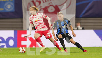 2021-09-28 - Emil Forsberg of Leipzig and Eduard Sobol of Club Brugge during the UEFA Champions League, Group A football match between Red Bull Leipzig and Club Brugge on September 28, 2021 at Red Bull Arena in Leipzig, Germany - RED BULL LEIPZIG VS CLUB BRUGGE - UEFA CHAMPIONS LEAGUE - SOCCER