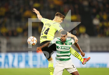 2021-09-28 - Matheus Reis of Sporting and Thomas Meunier of Borussia Dortmund during the UEFA Champions League, Group C football match between Borussia Dortmund and Sporting CP on September 28, 2021 at Signal Iduna Park in Dortmund, Germany - BORUSSIA DORTMUND VS SPORTING CP - UEFA CHAMPIONS LEAGUE - SOCCER