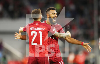 2021-09-29 - Eric Maxim Choupo-Moting of Bayern Munich celebrates after the 5-0 goal with Lucas Hernandez during the UEFA Champions League, Group E football match between Bayern Munich and Dynamo Kiev on September 29, 2021 at Allianz Arena in Munich, Germany - BAYERN MUNICH VS DYNAMO KIEV - UEFA CHAMPIONS LEAGUE - SOCCER