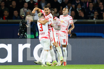 2021-10-19 - Andre Silva of RB Leipzig celebrates after scoring his sides first goal with Jose Angel Esmoris Tasende during the UEFA Champions League, Group A football match between Paris Saint-Germain and RB Leipzig on October 19, 2021 at Parc des Princes stadium in Paris, France - PARIS SAINT-GERMAIN VS RB LEIPZIG - UEFA CHAMPIONS LEAGUE - SOCCER