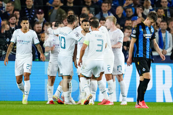 2021-10-19 - Riyad Mahrez of Manchester City celebrates his sides second goal with his team mates during the UEFA Champions League, Group A football match between Club Brugge KV and Manchester City on October 19, 2021 at Jan Breydelstadion in Bruges, Belgium - CLUB BRUGGE KV VS MANCHESTER CITY - UEFA CHAMPIONS LEAGUE - SOCCER