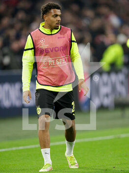 2021-10-19 - Donyell Malen of Borussia Dortmund warms up during the UEFA Champions League, Group C football match between Ajax and Borussia Dortmund on October 19, 2021 at Johan Cruijff ArenA in Amsterdam, Netherlands - AJAX VS BORUSSIA DORTMUND - UEFA CHAMPIONS LEAGUE - SOCCER