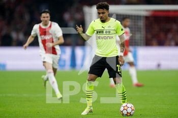 2021-10-19 - Donyell Malen of Borussia Dortmund during the UEFA Champions League, Group C football match between Ajax and Borussia Dortmund on October 19, 2021 at Johan Cruijff ArenA in Amsterdam, Netherlands - AJAX VS BORUSSIA DORTMUND - UEFA CHAMPIONS LEAGUE - SOCCER